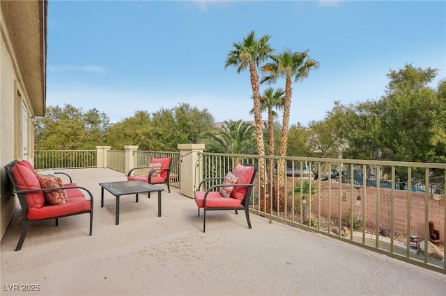 view of patio / terrace with a balcony