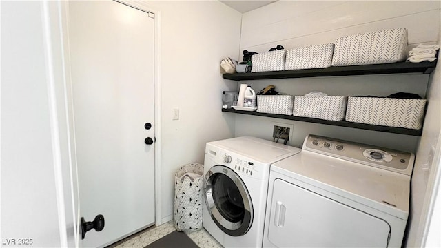 washroom with laundry area and washer and clothes dryer
