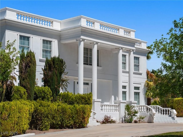view of front of house featuring stucco siding