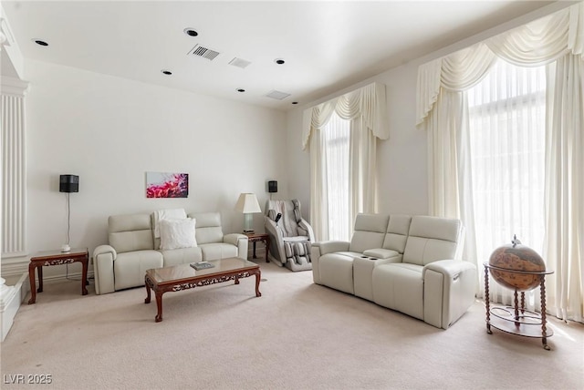 carpeted living room with visible vents