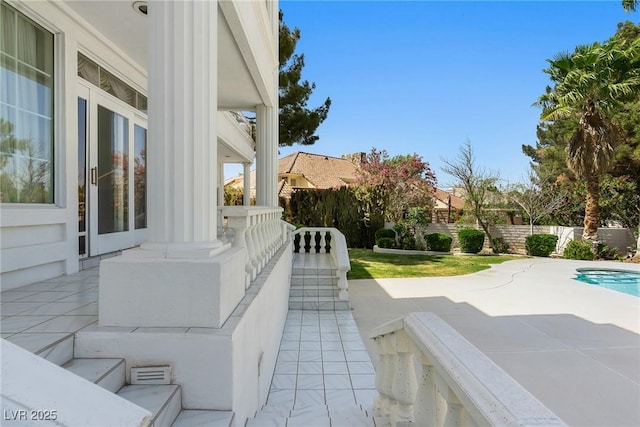 view of patio with a fenced in pool and a fenced backyard