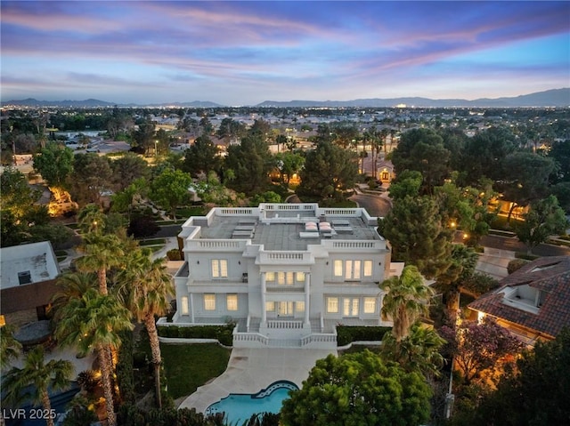 aerial view at dusk with a mountain view