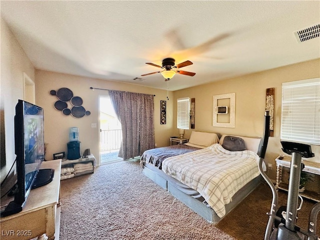 5634 Bishop Flowers St, Las Vegas, NV 89130 - carpeted bedroom featuring access to exterior and ceiling fan