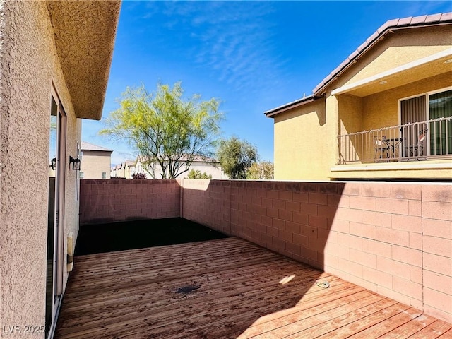 5634 Bishop Flowers St, Las Vegas, NV 89130 - view of property exterior featuring stucco siding, a balcony, and fence