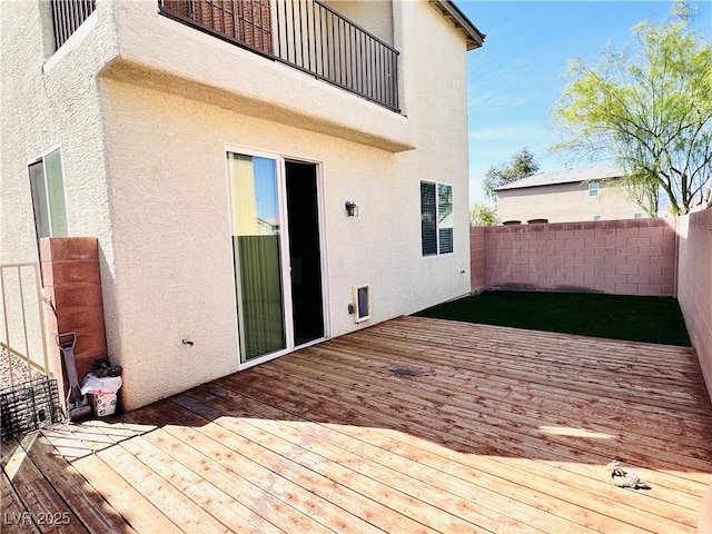 5634 Bishop Flowers St, Las Vegas, NV 89130 - wooden terrace with a fenced backyard