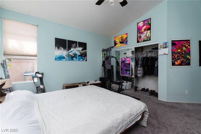 bedroom with a ceiling fan, carpet, a closet, and lofted ceiling