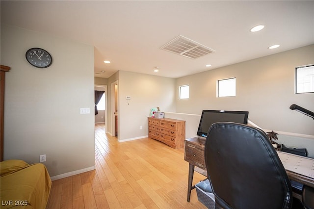 home office with recessed lighting, baseboards, visible vents, and light wood finished floors