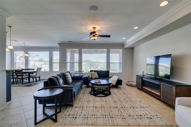 10372 Premia Pl, Las Vegas, NV 89135 - living area with crown molding, light tile patterned floors, a ceiling fan, a chandelier, and baseboards