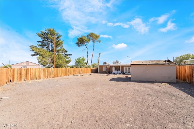 343 Tungsten St, Henderson, NV 89015 - view of yard with a fenced backyard and french doors