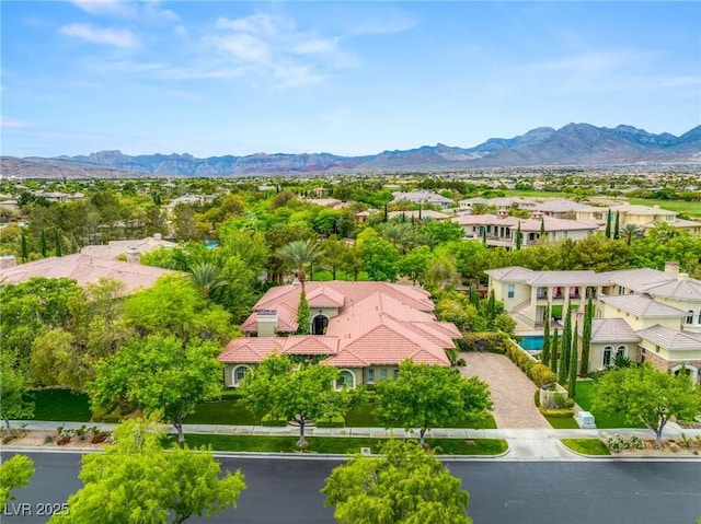 birds eye view of property with a residential view and a mountain view