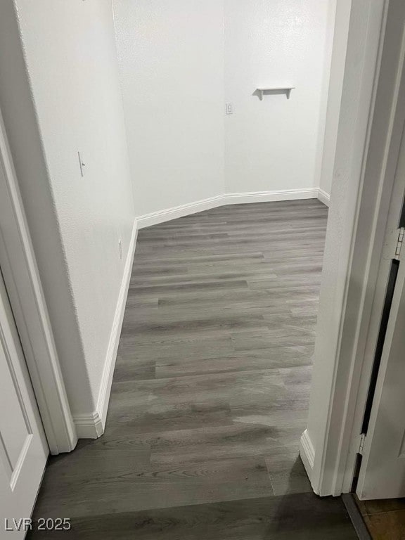 5711 Roundrock Dr, Las Vegas, NV 89142 - interior space featuring baseboards and wood finished floors