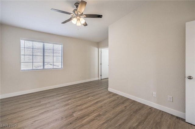 unfurnished room with baseboards, a ceiling fan, lofted ceiling, and wood finished floors