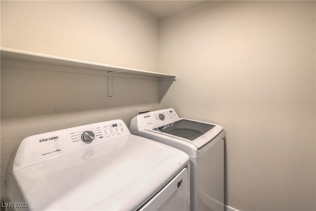 clothes washing area featuring laundry area and independent washer and dryer