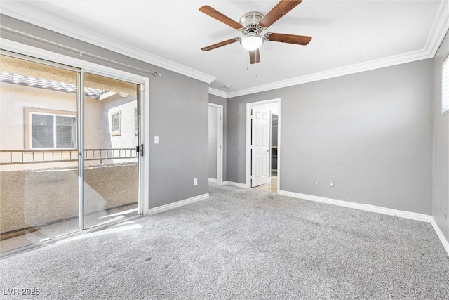 unfurnished bedroom with carpet floors, a ceiling fan, baseboards, and ornamental molding
