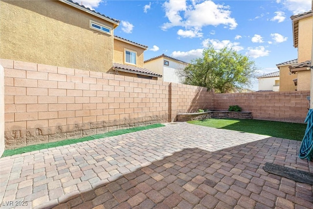 view of patio / terrace featuring a fenced backyard