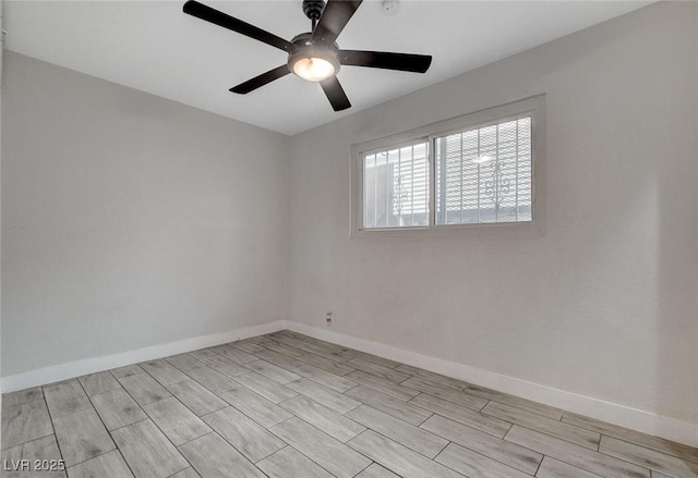 empty room featuring ceiling fan, baseboards, and light wood finished floors
