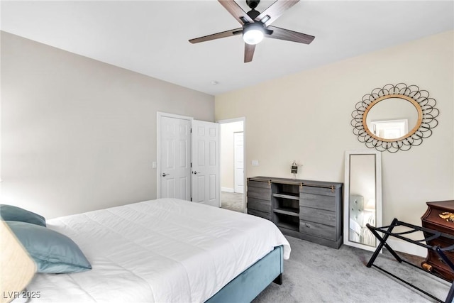 carpeted bedroom featuring a ceiling fan