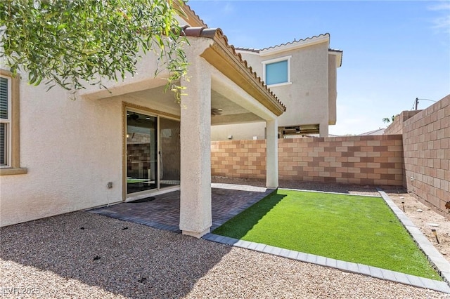 view of yard featuring a fenced backyard and a patio area