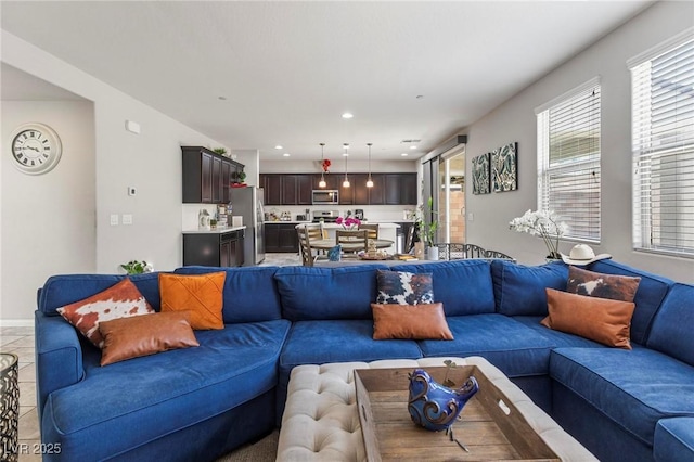 living area featuring recessed lighting and plenty of natural light