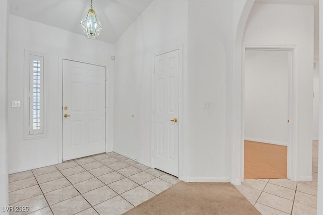 880 Autumn Canyon Way, Henderson, NV 89002 - entryway featuring light tile patterned floors, baseboards, and arched walkways