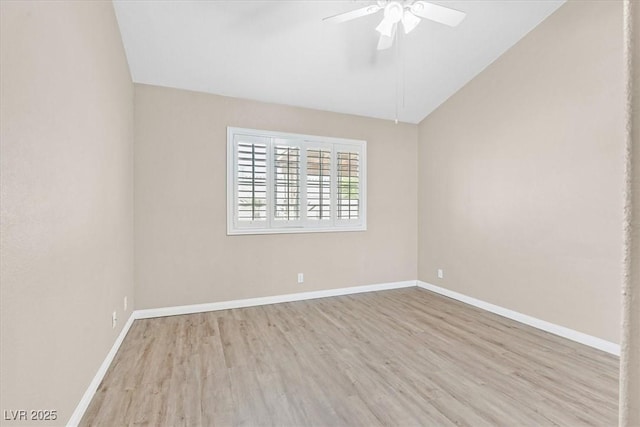 880 Autumn Canyon Way, Henderson, NV 89002 - spare room featuring baseboards, ceiling fan, wood finished floors, and lofted ceiling