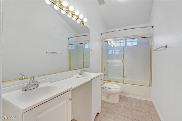 880 Autumn Canyon Way, Henderson, NV 89002 - bathroom with a sink, tile patterned floors, toilet, and double vanity