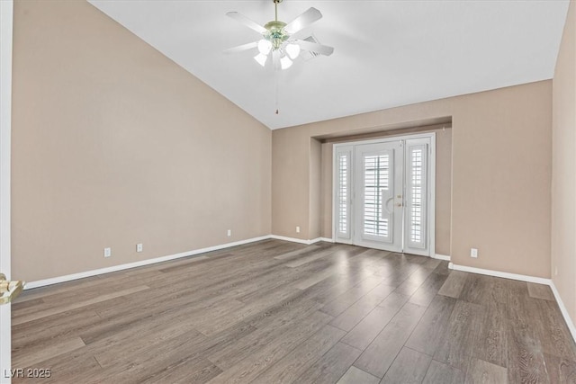 880 Autumn Canyon Way, Henderson, NV 89002 - spare room featuring baseboards, ceiling fan, lofted ceiling, and wood finished floors