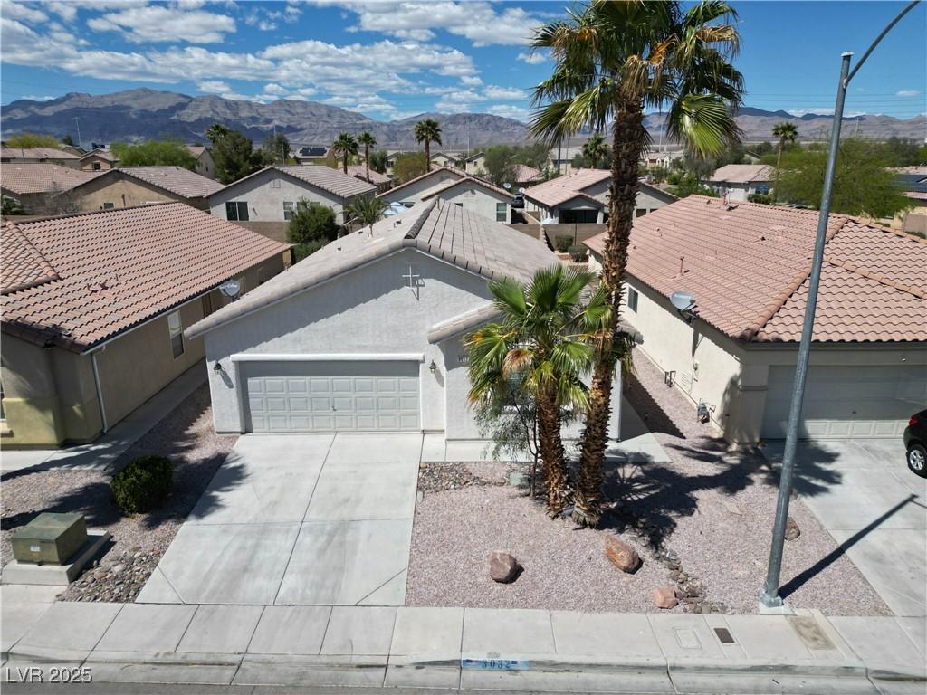 3032 Hartley Cove Ave, North Las Vegas, NV 89081 - bird's eye view featuring a mountain view and a residential view