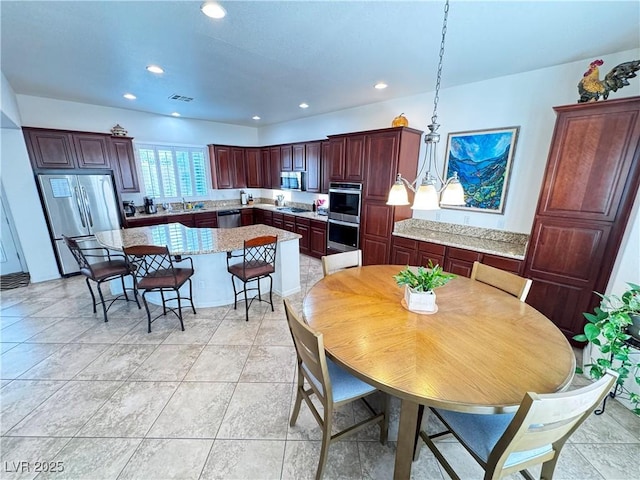 dining area featuring visible vents and recessed lighting