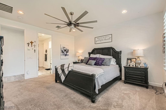 carpeted bedroom with recessed lighting, baseboards, and visible vents