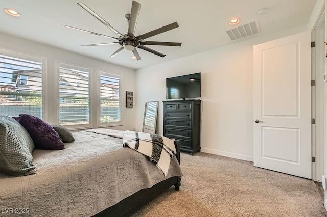 bedroom featuring ceiling fan, visible vents, baseboards, light carpet, and recessed lighting