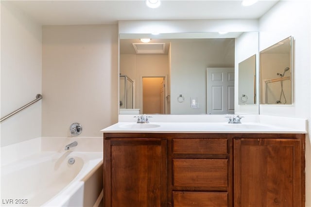 bathroom featuring an enclosed shower, double vanity, a sink, and a garden tub