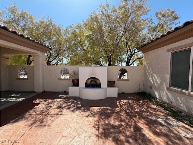 view of patio / terrace with fence