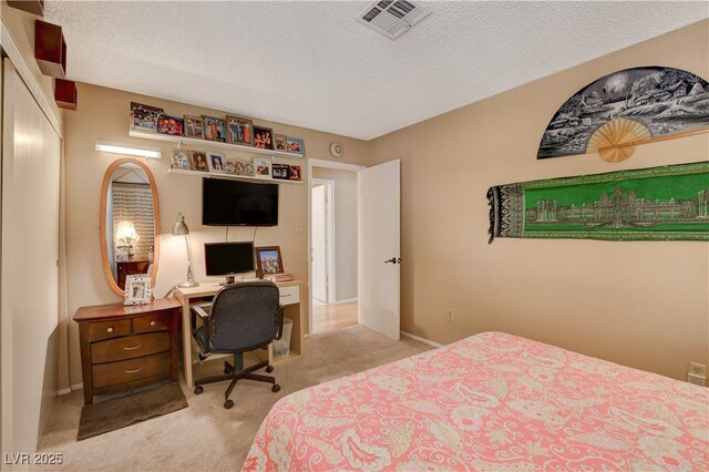 611 Spyglass Ln, Las Vegas, NV 89107 - carpeted bedroom featuring a textured ceiling and visible vents