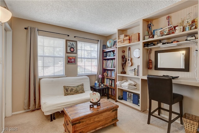 611 Spyglass Ln, Las Vegas, NV 89107 - sitting room featuring a textured ceiling and light colored carpet