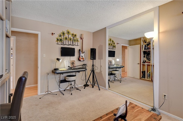 611 Spyglass Ln, Las Vegas, NV 89107 - carpeted office space featuring baseboards and a textured ceiling