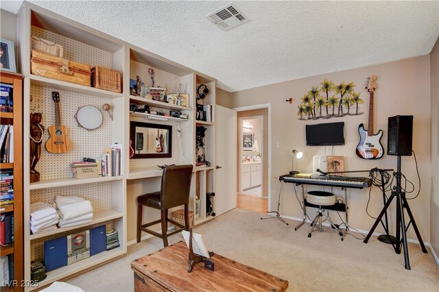 611 Spyglass Ln, Las Vegas, NV 89107 - office featuring baseboards, carpet flooring, a textured ceiling, and visible vents