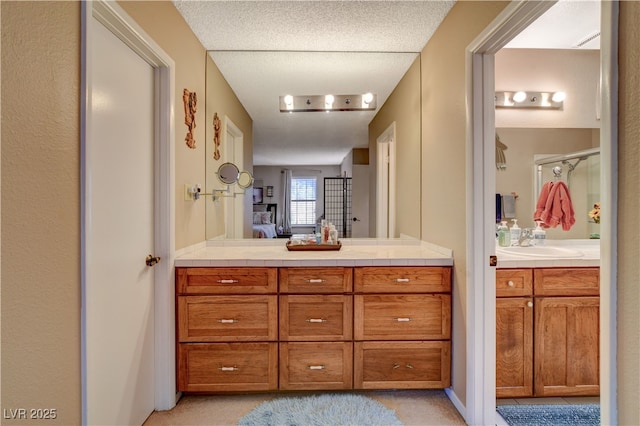 611 Spyglass Ln, Las Vegas, NV 89107 - bathroom featuring ensuite bathroom and vanity