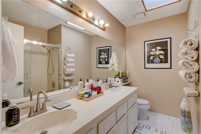 611 Spyglass Ln, Las Vegas, NV 89107 - full bathroom featuring a sink, tile patterned flooring, toilet, visible vents, and a stall shower