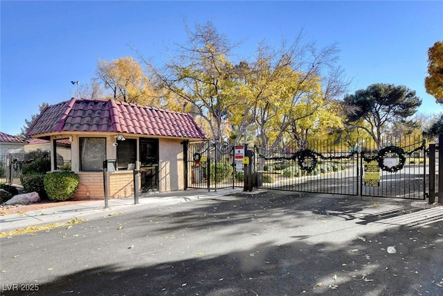 611 Spyglass Ln, Las Vegas, NV 89107 - view of gate featuring fence