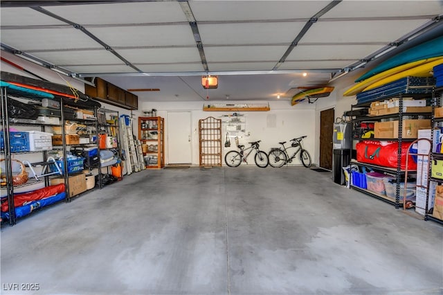 611 Spyglass Ln, Las Vegas, NV 89107 - garage featuring a garage door opener