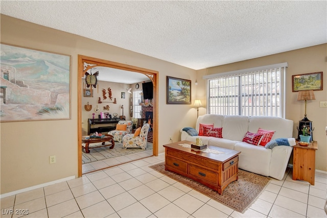 611 Spyglass Ln, Las Vegas, NV 89107 - living area with a textured ceiling and light tile patterned flooring