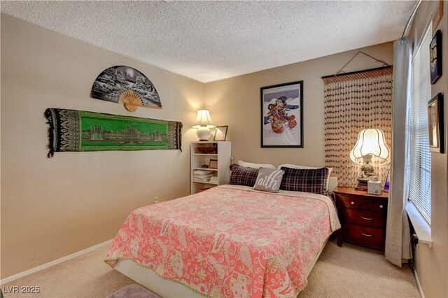 611 Spyglass Ln, Las Vegas, NV 89107 - bedroom with baseboards, carpet flooring, and a textured ceiling