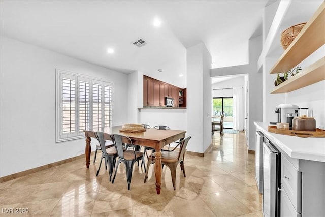 dining space with recessed lighting, baseboards, visible vents, and wine cooler