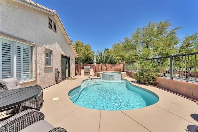 view of swimming pool with a fenced backyard, a pool with connected hot tub, and a patio area