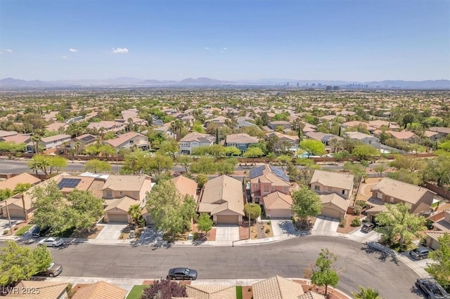 bird's eye view with a residential view and a mountain view