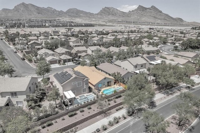 drone / aerial view with a residential view and a mountain view