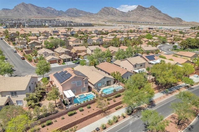 aerial view featuring a residential view and a mountain view