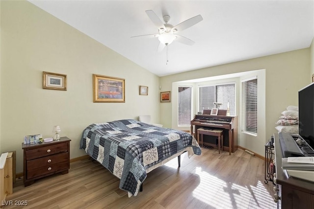 2725 Byron Dr, Las Vegas, NV 89134 - bedroom featuring vaulted ceiling, light wood-style flooring, baseboards, and ceiling fan