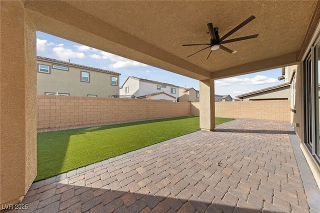 595 Beverly Pine Pl, Henderson, NV 89011 - view of patio / terrace with ceiling fan, a residential view, and a fenced backyard